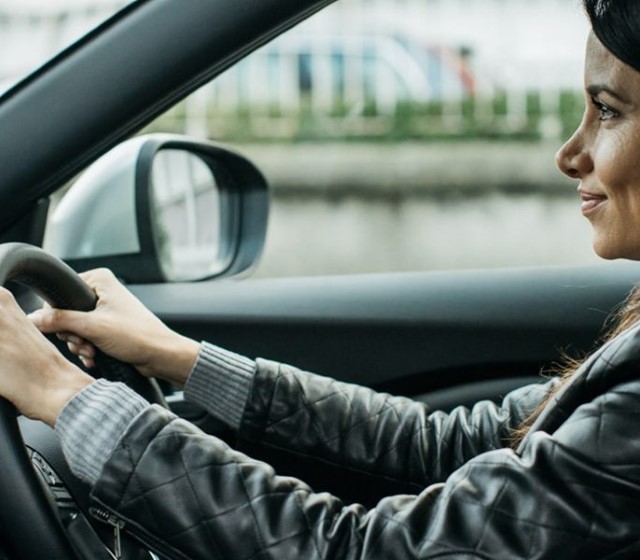 Women driving a Nissan