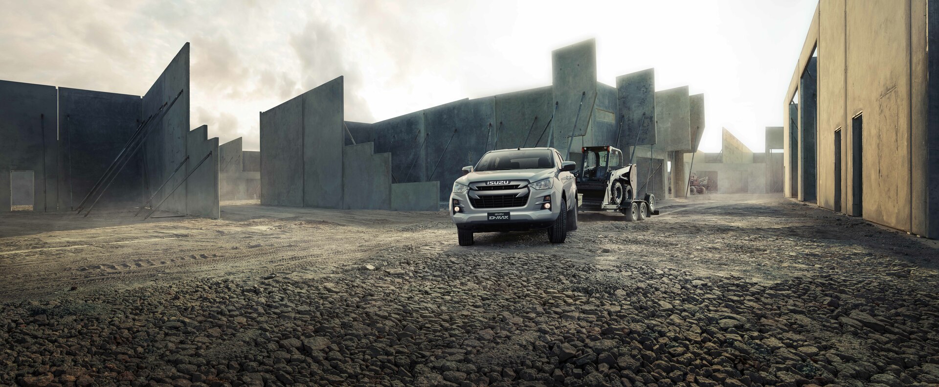 Isuzu D-Max DL20 beside factories