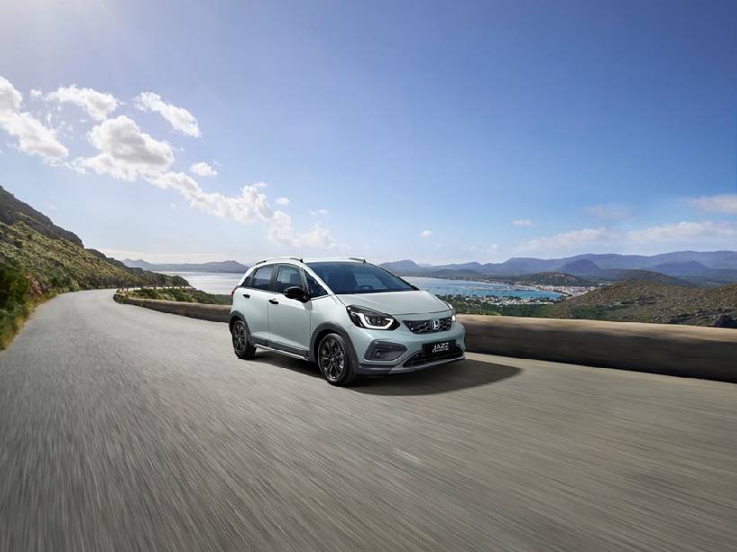 Silver Honda Jazz in the mountains