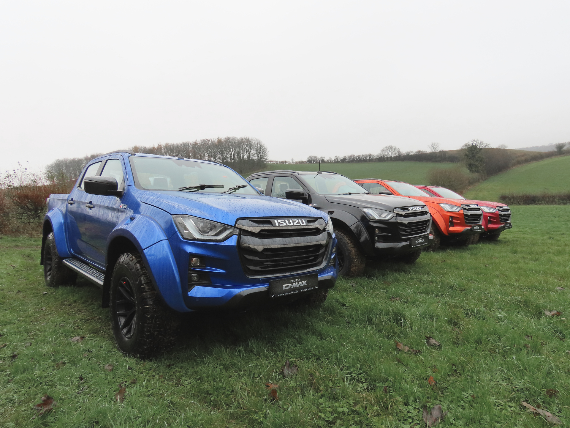 blue, black and red Isuzu D-Max Artic Truck T35