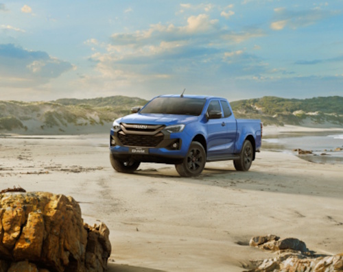 blue ISUZU D-MAX Isuzu V-Cross by the beach