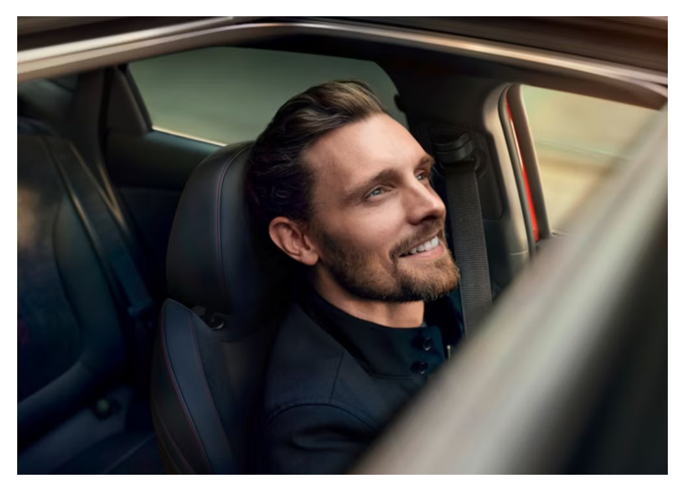 man in car