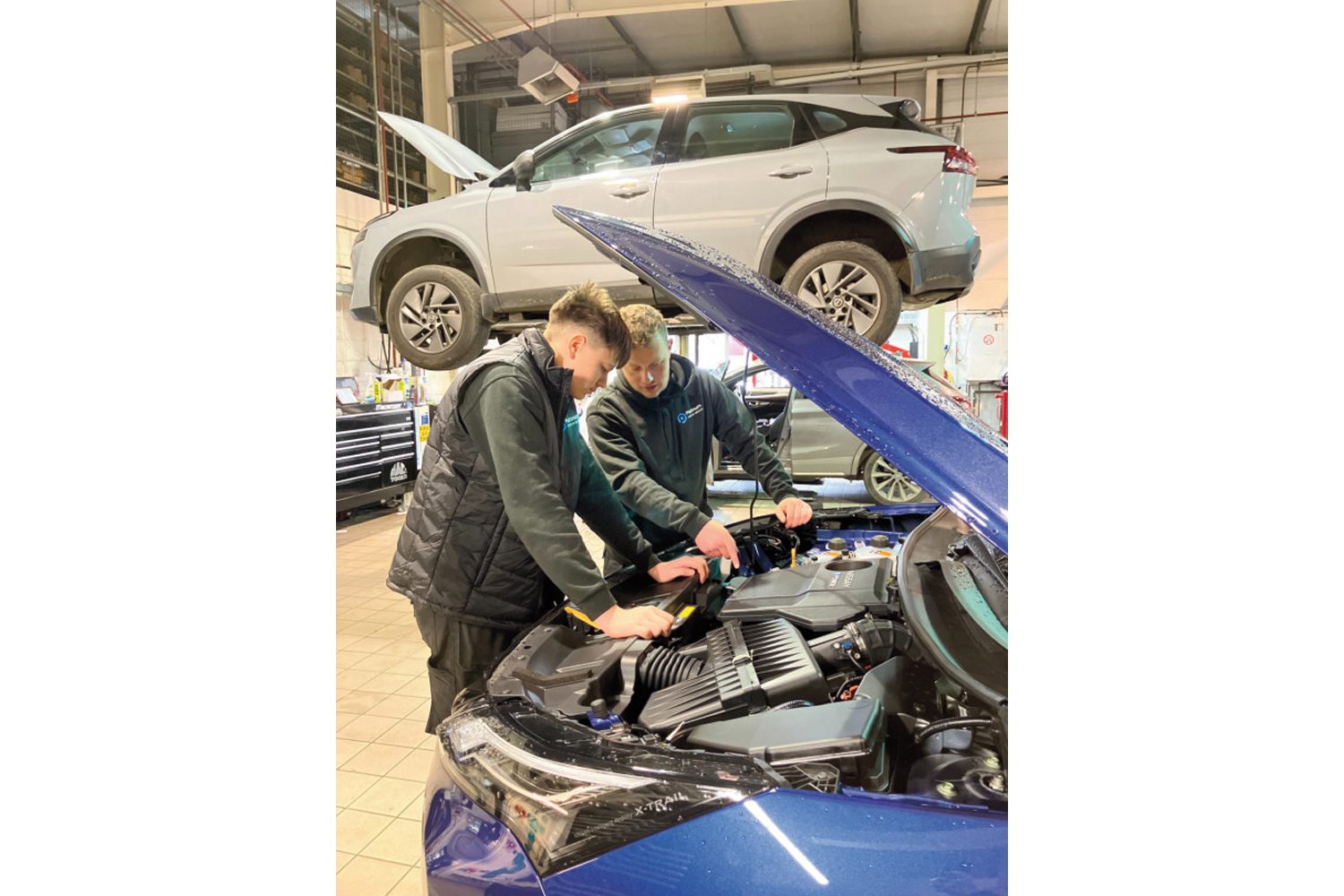 picture of an apprentice learning on the job