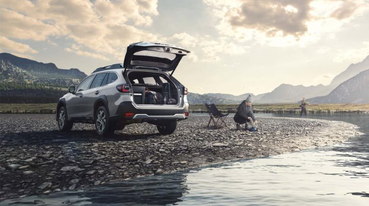 Silver Subaru Outback with rear boot door open