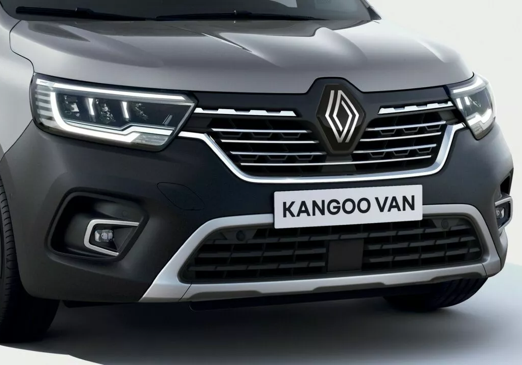 Close-up of the front grille and headlights of a grey Renault Kangoo van, highlighting the Renault logo and the "Kangoo Van" number plate.