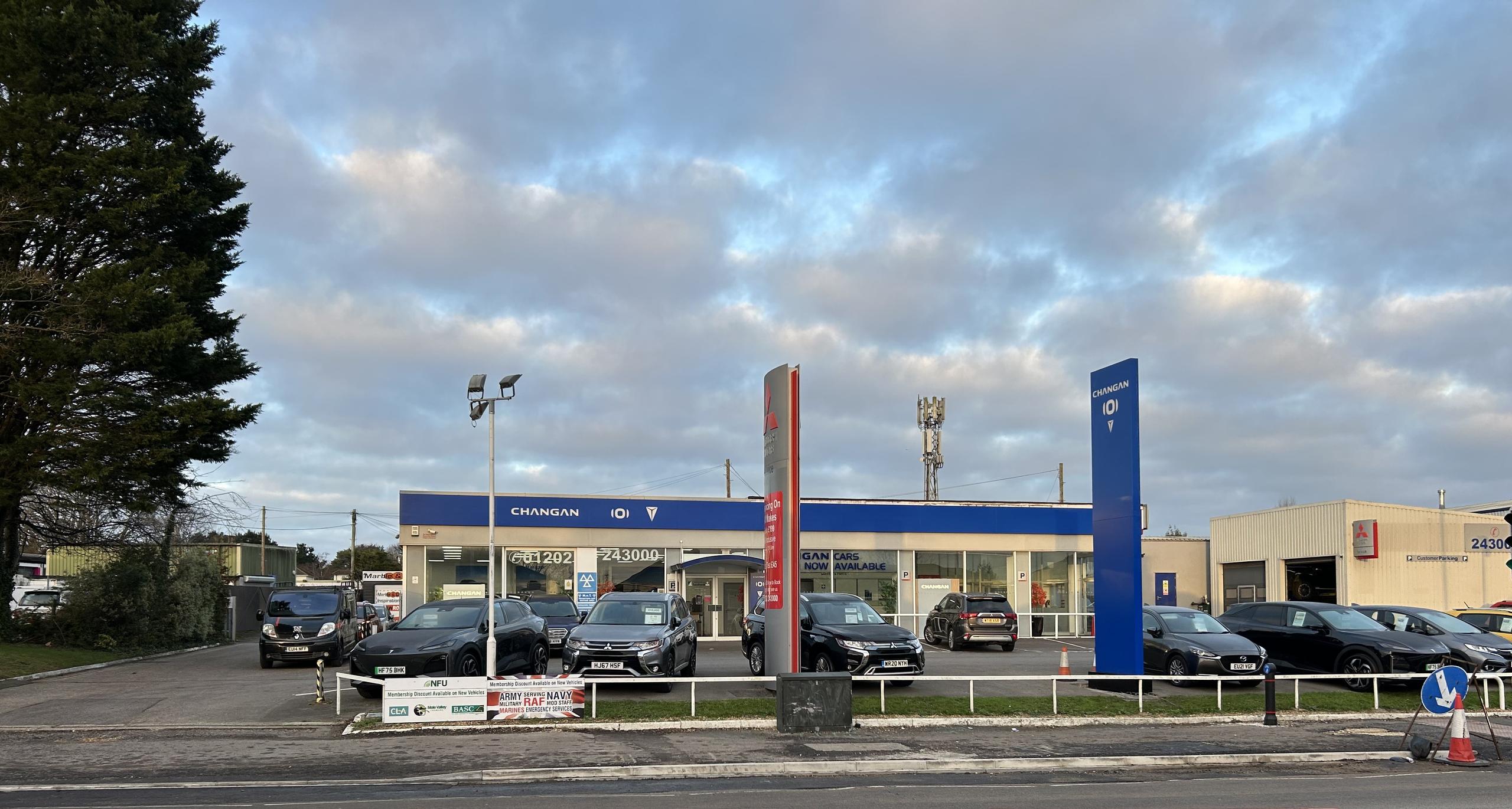 An exterior view of the magna changan car dealership in dorset.