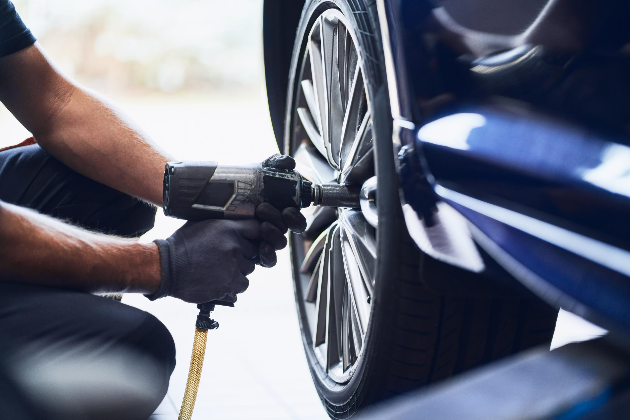 Technician Changing Tyre