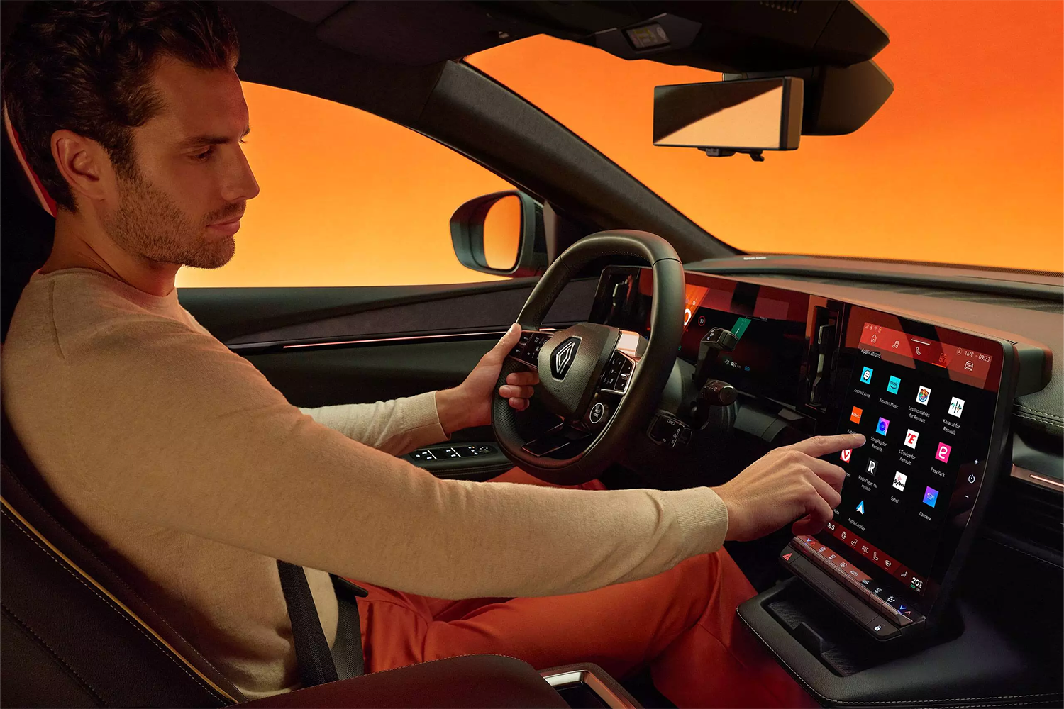 man driving megane