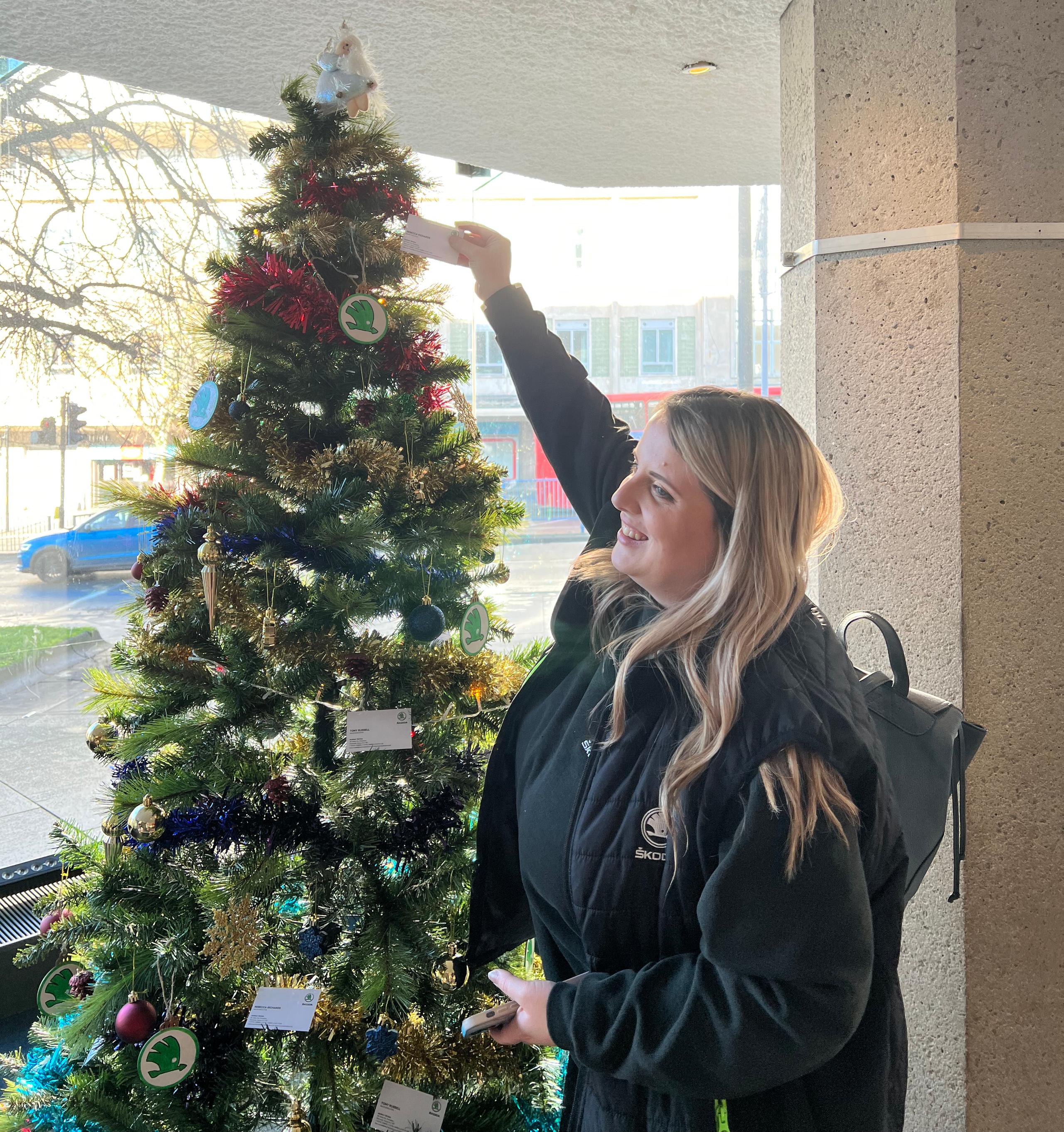 Kylie decorating the tree