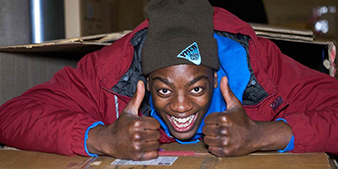 Man holding two thumbs up