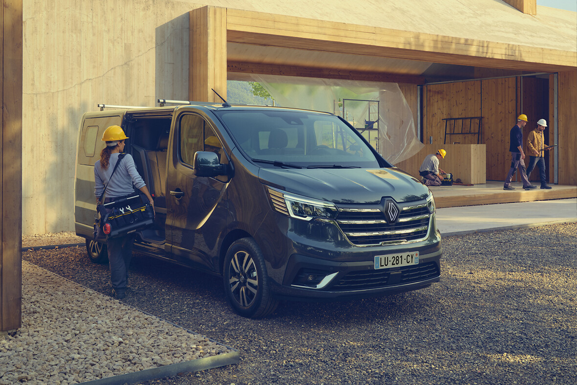 lady with hardhat getting in van