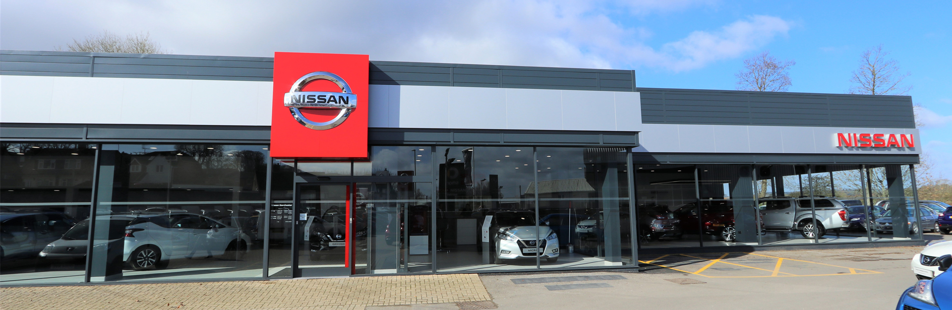 Dorchester nissan dealership storefront.