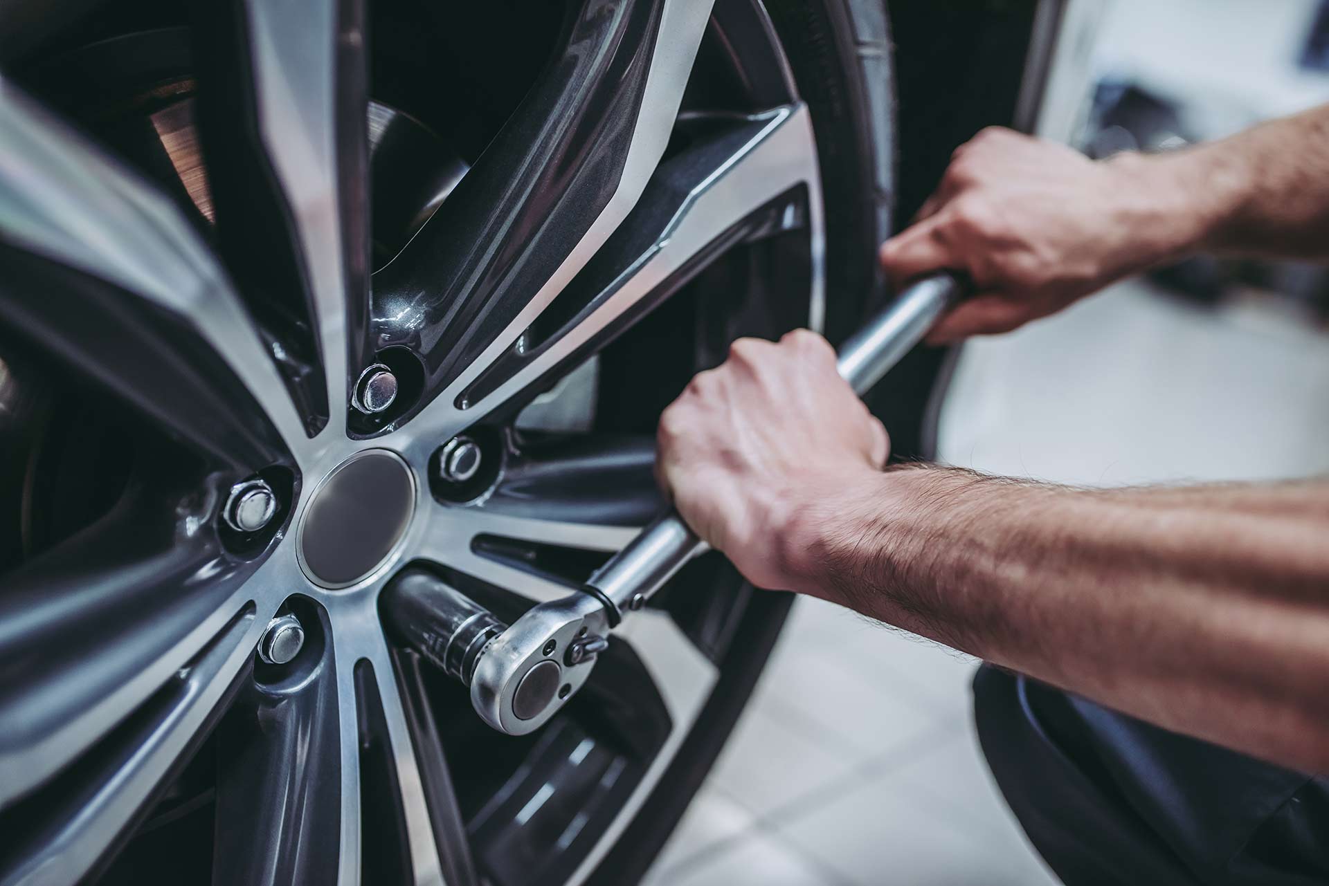 wheel nuts being tightened