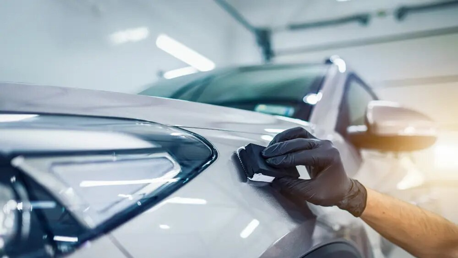 Person Polishing Vehicle
