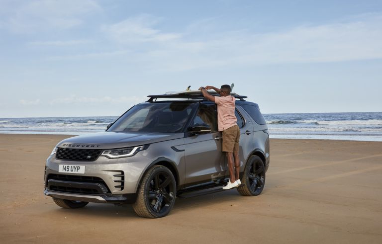 man on his Land Rover Discovery