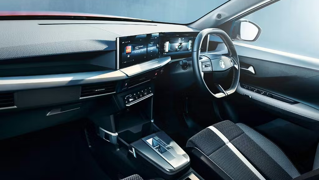 Vauxhall Frontera interior showing the dashboard, steering wheel and digital display.