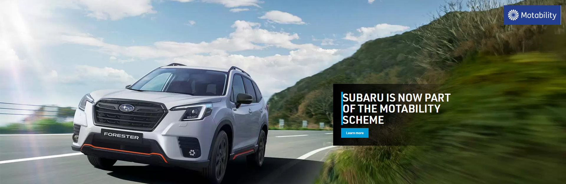 Subaru Forrester driving on road part of the Motability range 