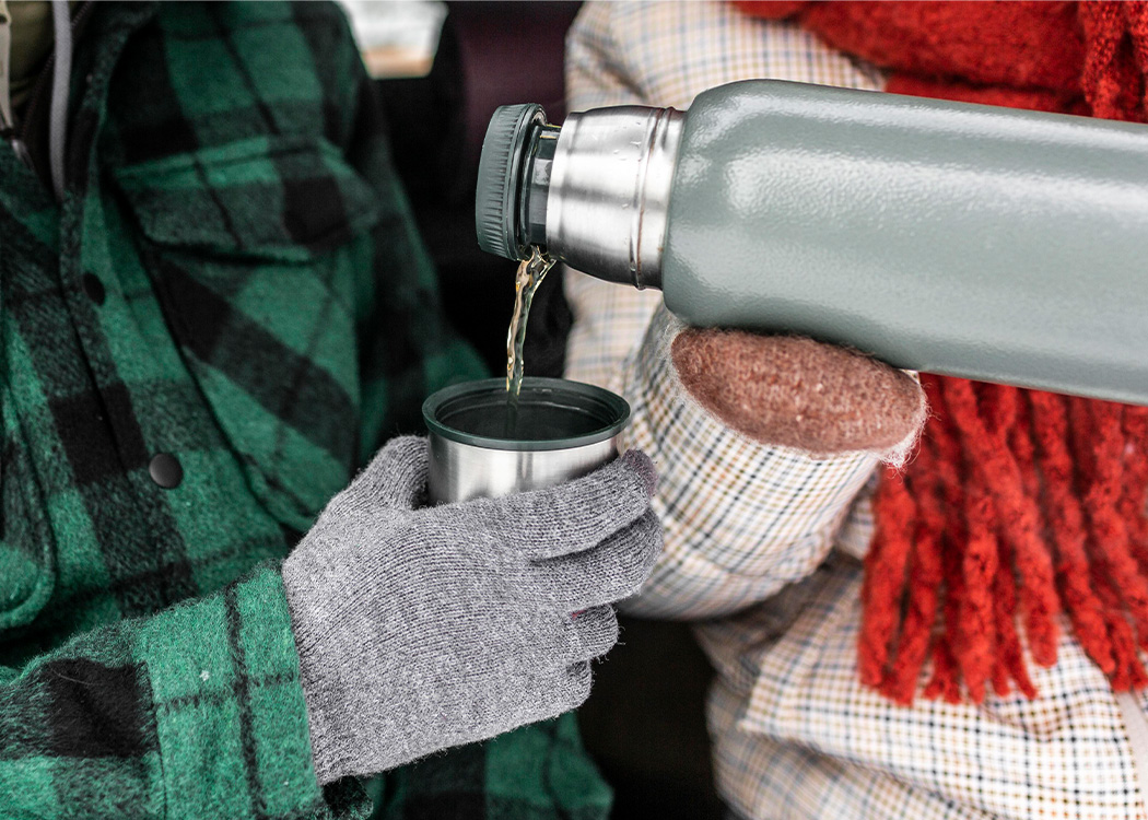 drinking tea out of flask