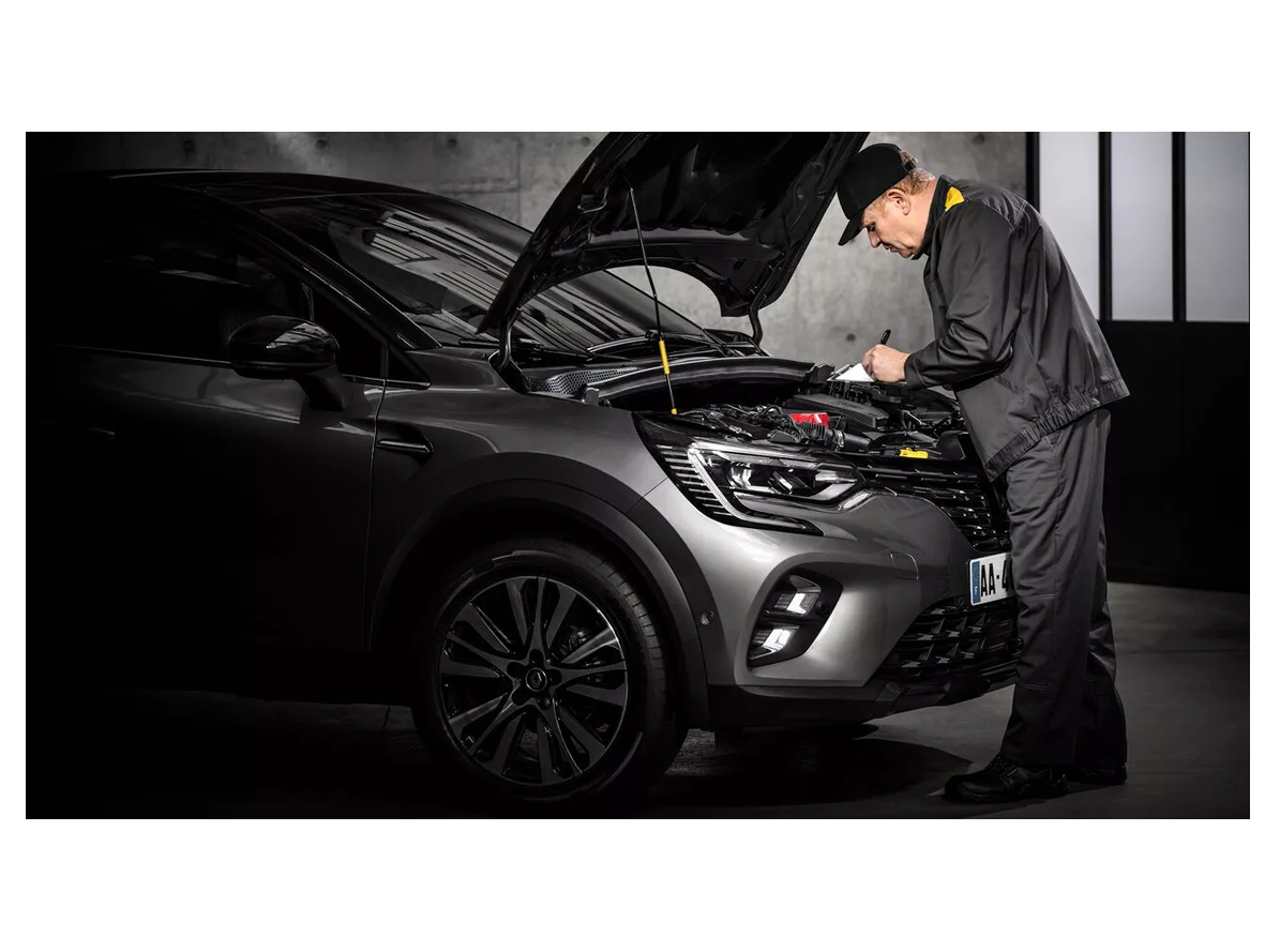 mechanic working on a renault vehicle