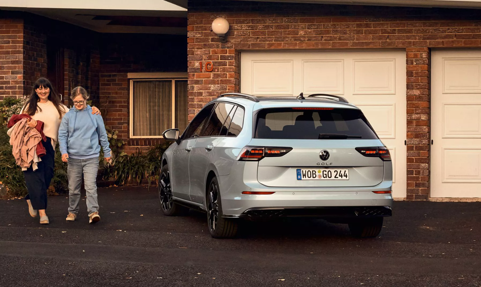 White Golf Estate Rear Side View