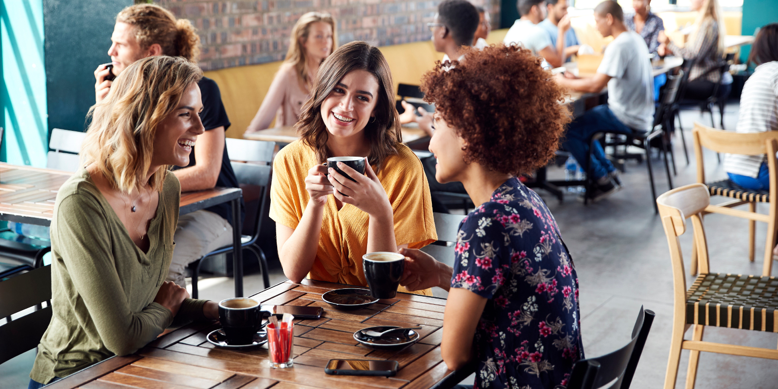 Group of women chatting over coffee