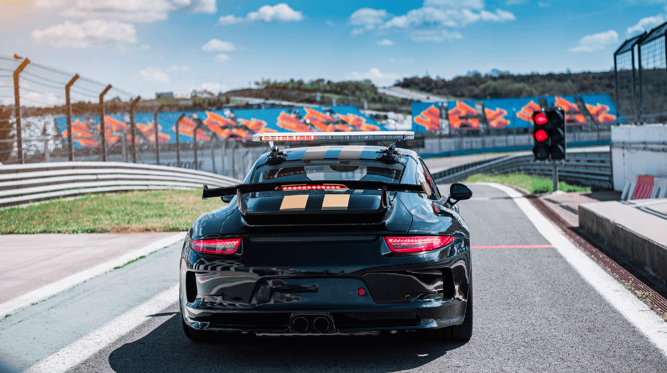 black porsche on race track