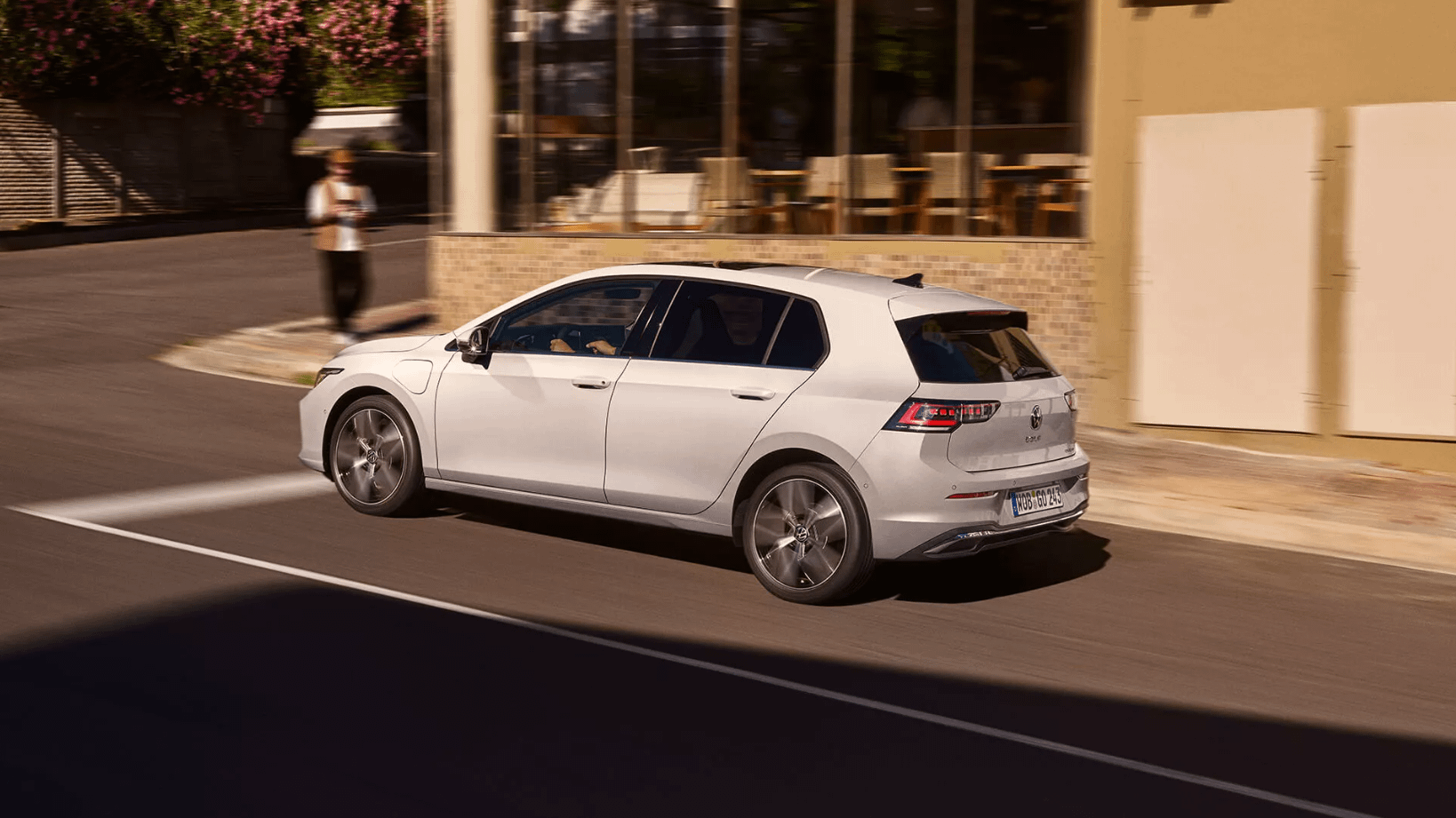 White Volkswagen Golf Rear Side View