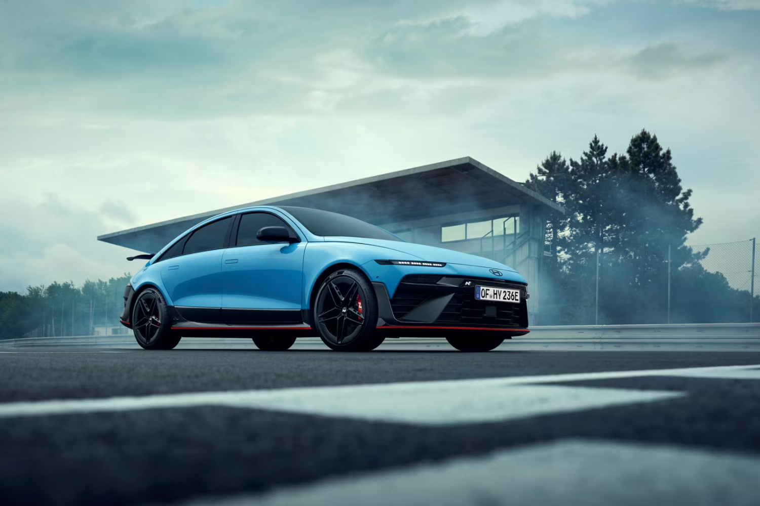 all-new Hyundai IONIQ 6 N in performance blue on a race track with smoke