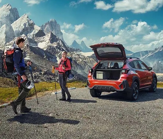 Camping with red Subaru Crosstrek