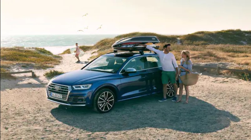 Audi Vehicle Parked On Beach