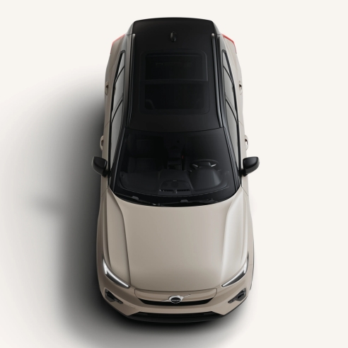 Top Down View Of The Volvo EX40 Showcasing Its Roof In A White Studio Environment