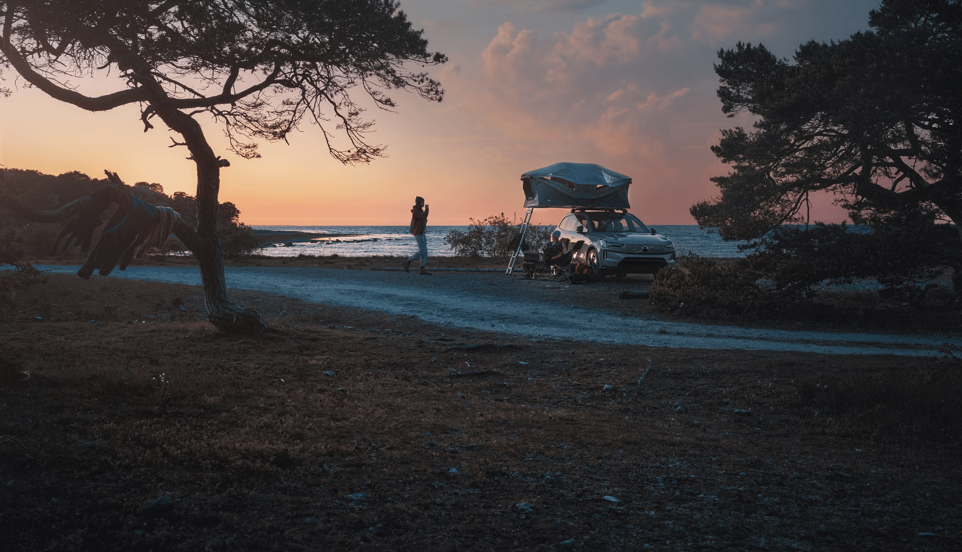 car being used for camping on beach