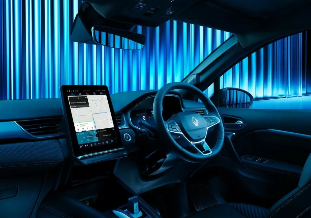 Driver-focused cockpit of Renault Symbioz with digital display and large central touchscreen infotainment system.
