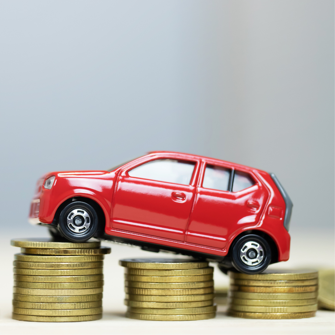 Red car on money how to save money on your car