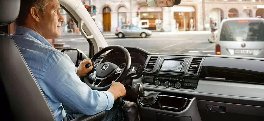Man inside a Volkswagen in driving seat