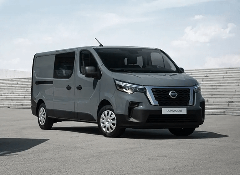 Grey Nissan Primastar parked front facing