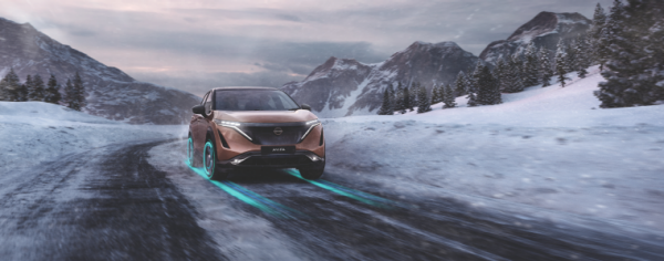 Nissan Ariya driving through snowy roads