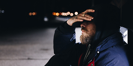 Man holding his head