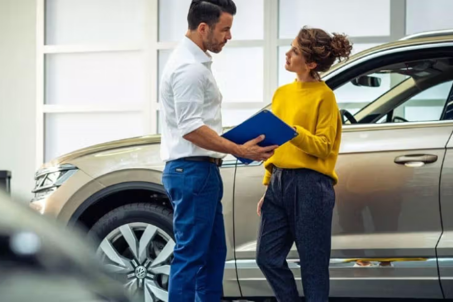 Volkswagen Employee With Customer