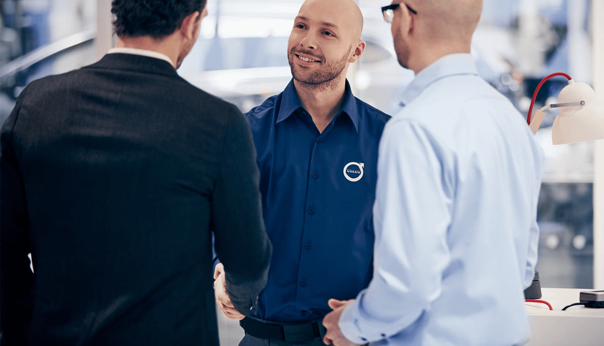 volvo employee talking to customers