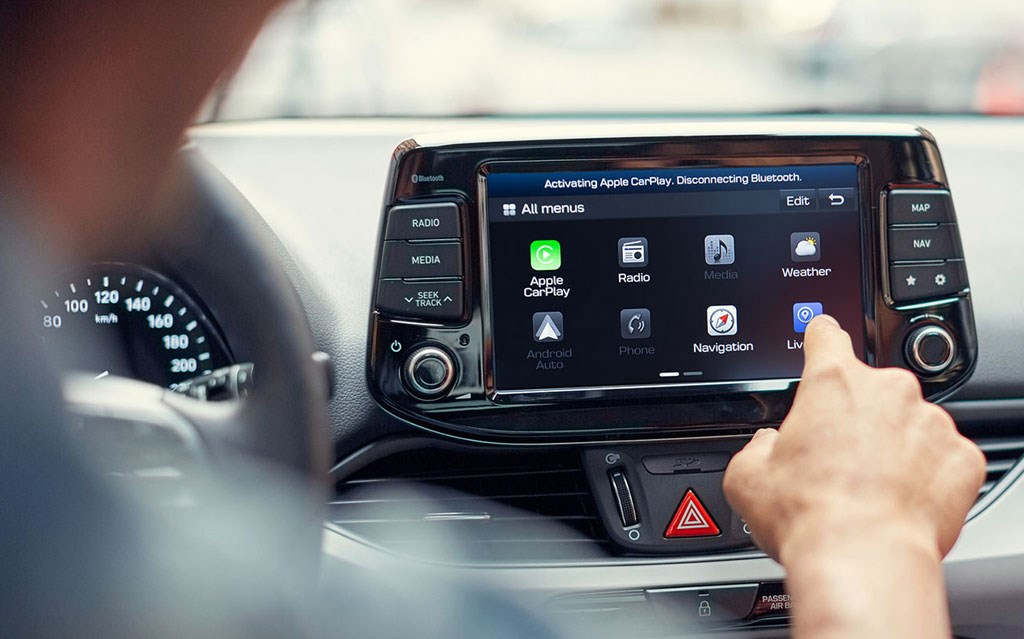 Driver using the touch screen of a Hyundai