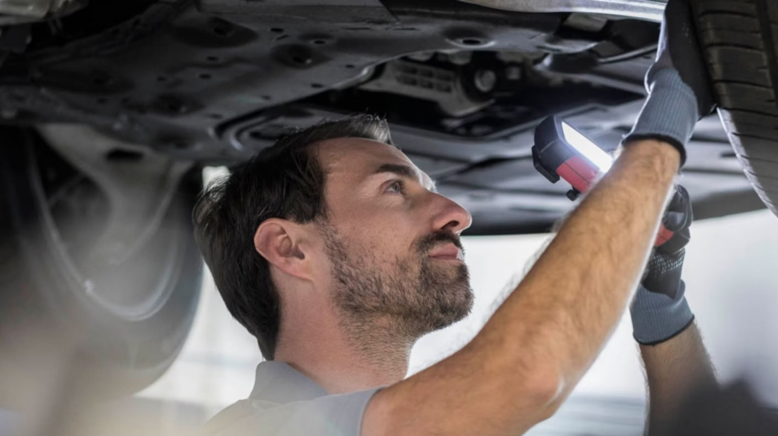Mechanic working on a vehicle