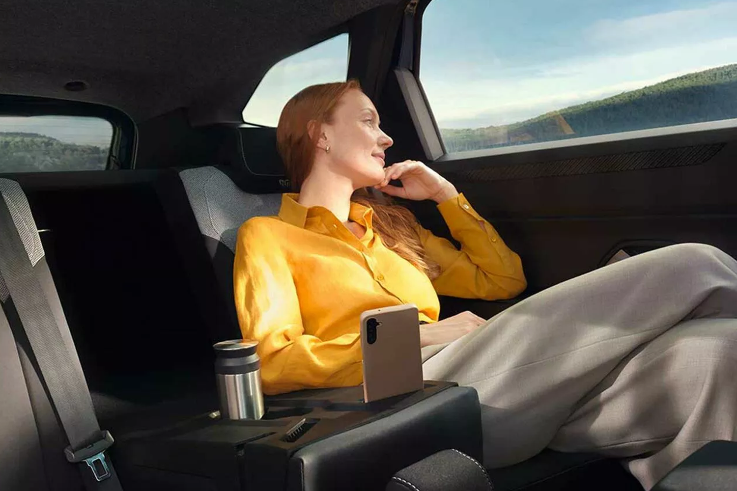 woman sat in the back of the all-new Dacia Bigster