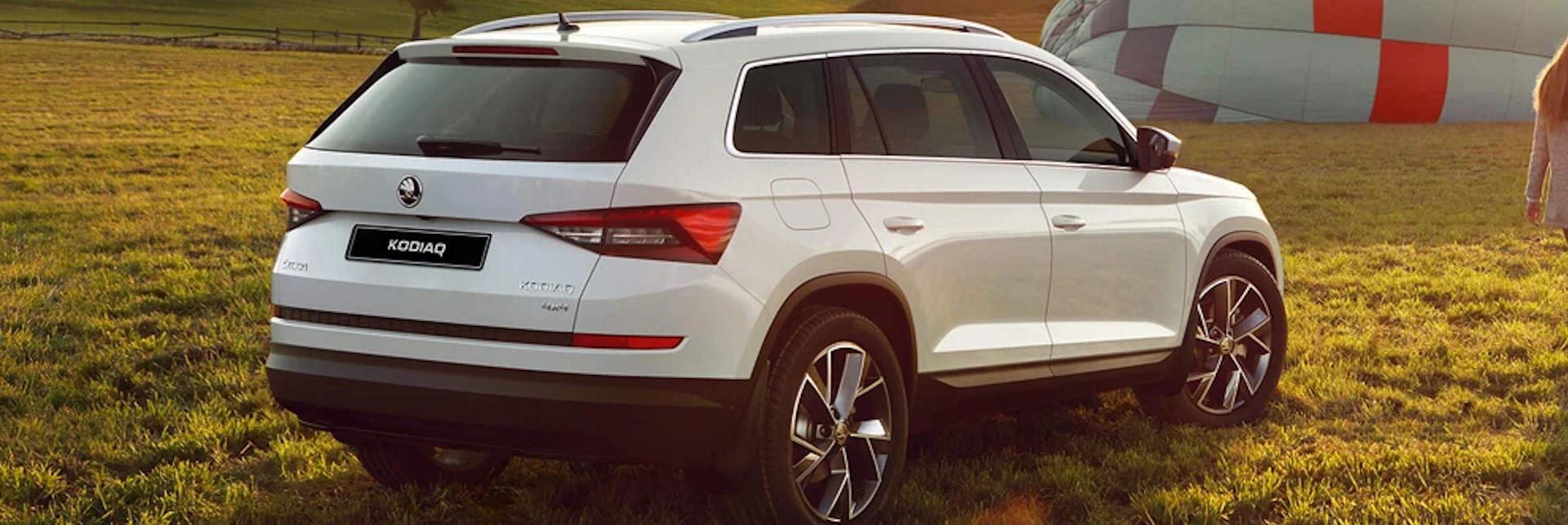 White SKODA Kodiaq Rear Side View