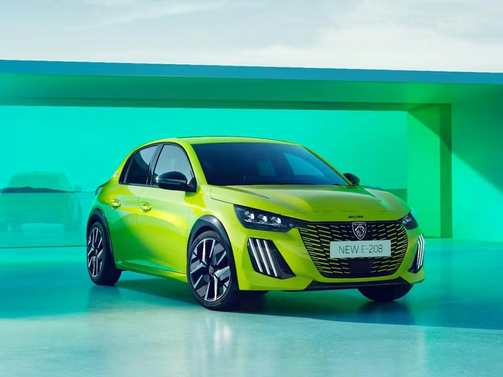 Lime green Peugeot E-208 shown from the front three-quarter angle, highlighting its distinctive grille design, LED lighting and all-electric hatchback styling.
