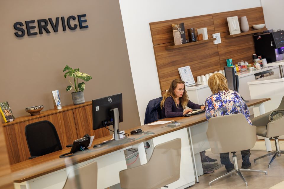 Service Team Member with customer