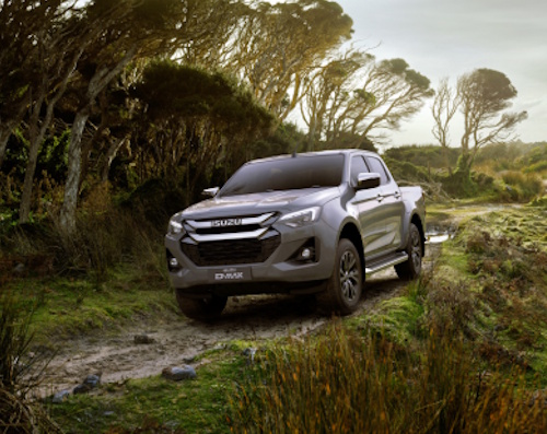 Black Isuzu DL40 in a forest