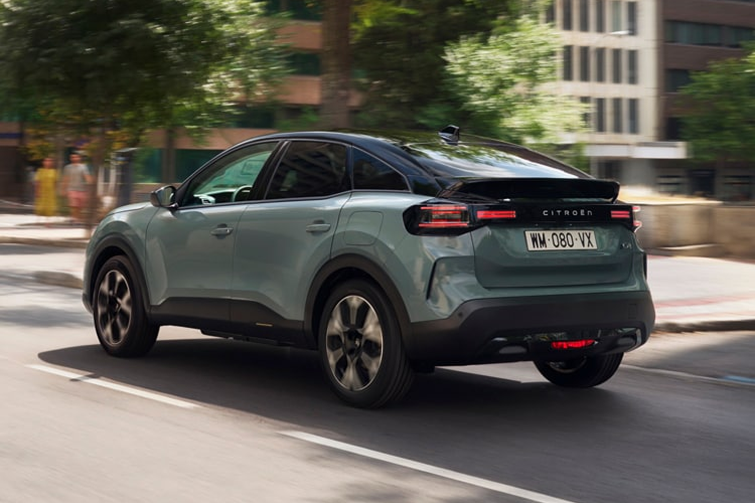 rear side view of the New C4 on the road