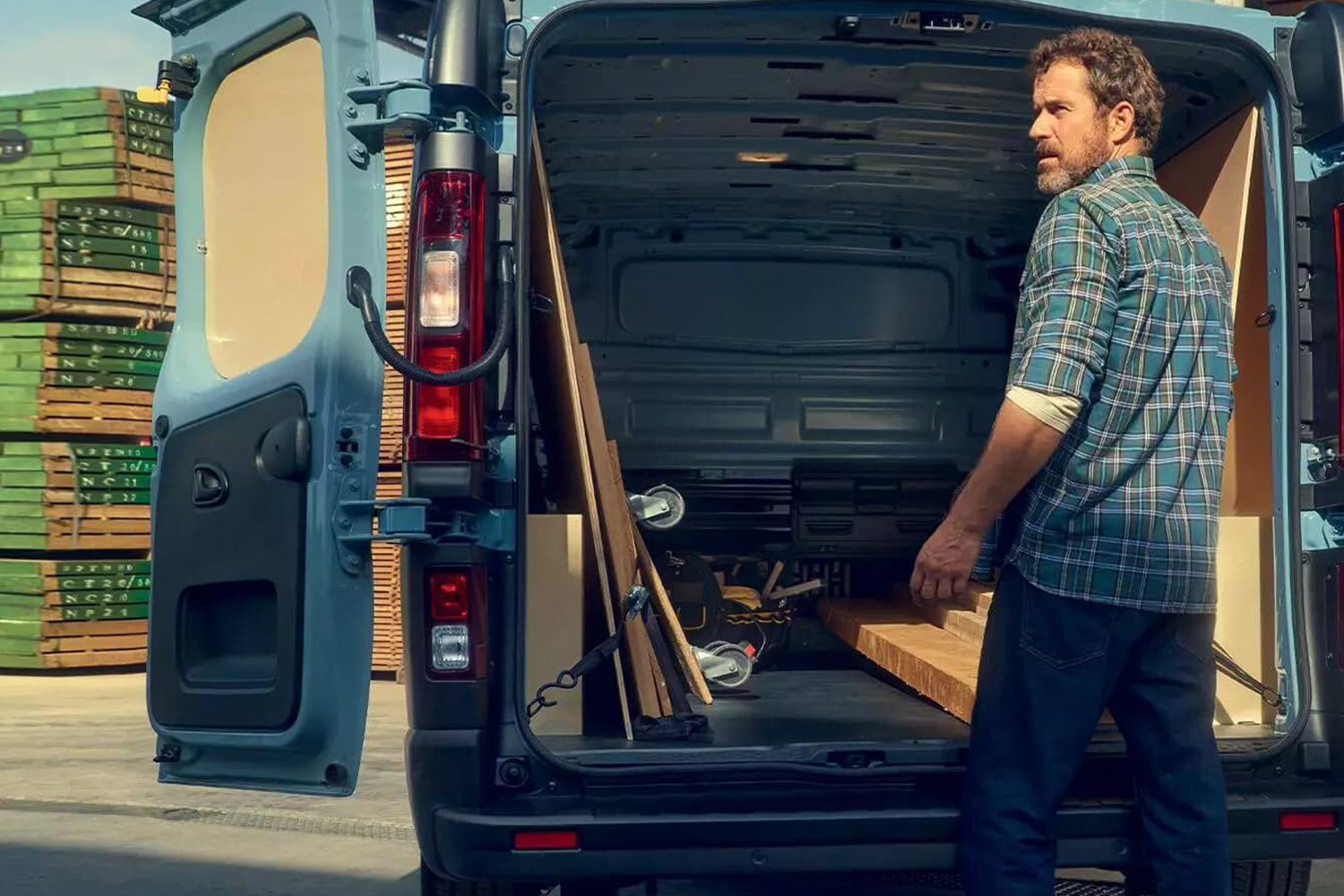 van with wood in the boot