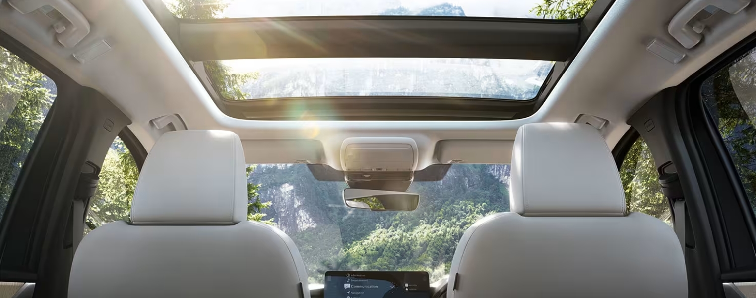 Mazda CX-60 interior view highlighting the sunroof and cabin design.